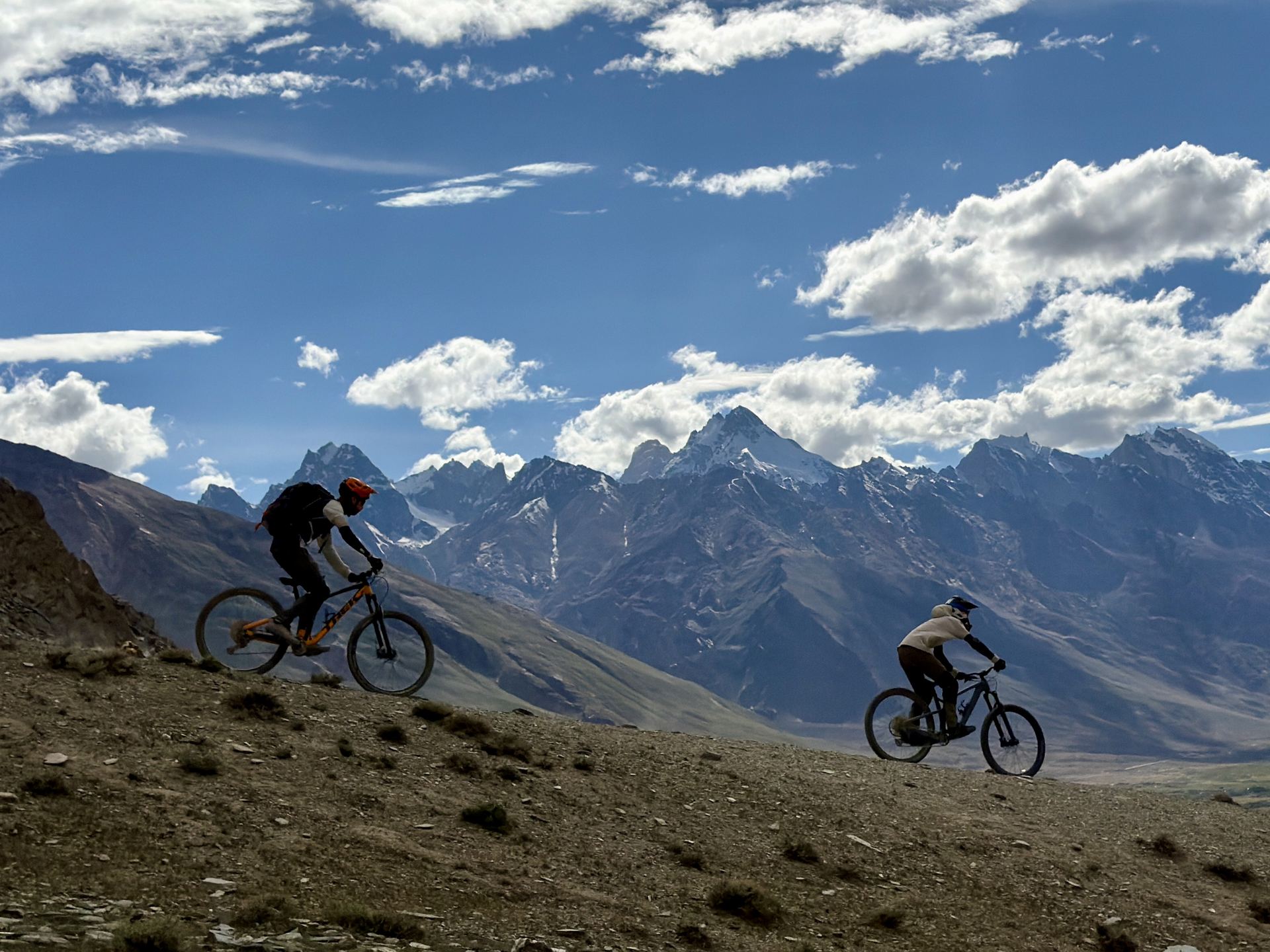 Rider on a Zanskar ridgeline beneath open sky