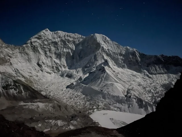 A starry night with snow and ice combine for spectacular views over the Imja Glacier and Imja Lake. #himalayas #nepal #trekking #climbing